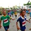 Labarik hola parte iha Korrida Halai ba Dame durante Maratona Dili